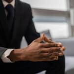 How Body Language Signals Wealth and Confidence Before You Speak